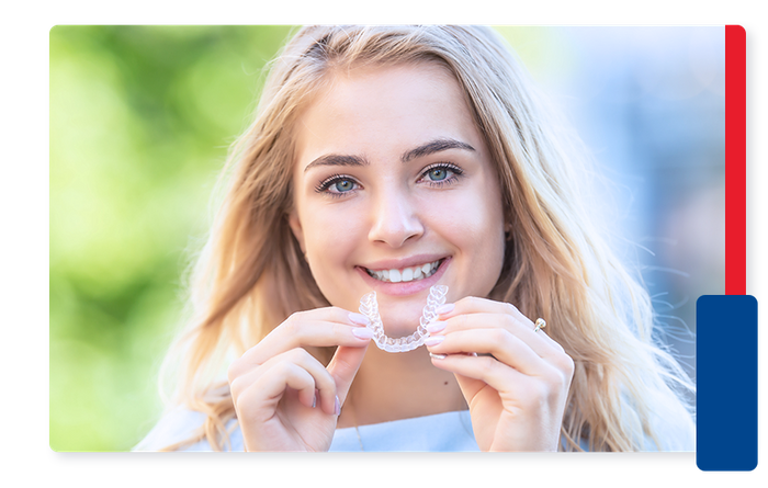 image of a teen holding Invisalign