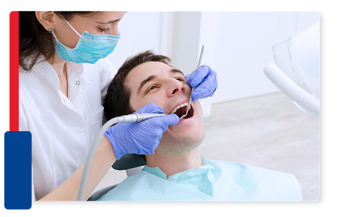 Man getting his teeth checked by dentist