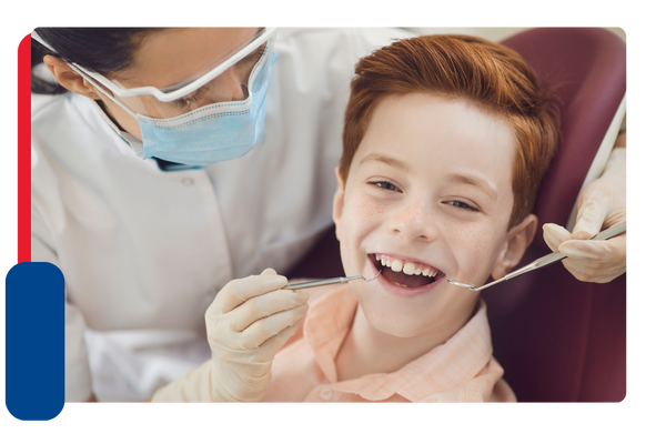 boy smiling at dentist office