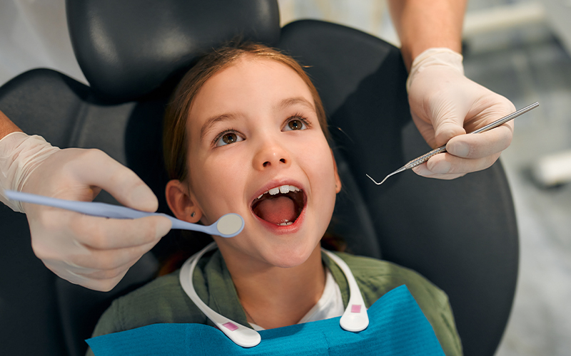 image of a child at the dentist