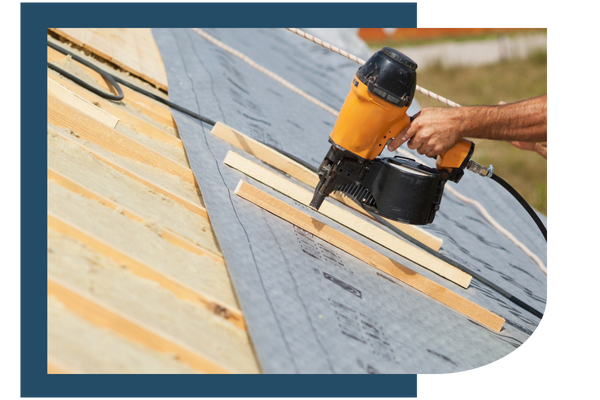 Contractor installing a new roof