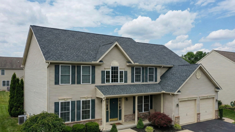 A suburban home with a new roof A suburban home with a new roof