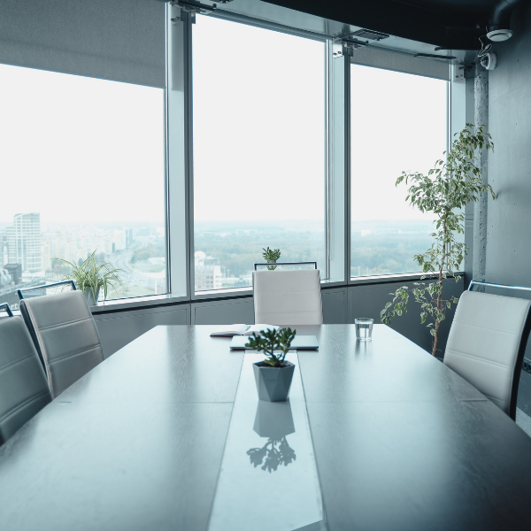 conference table in front of large windows