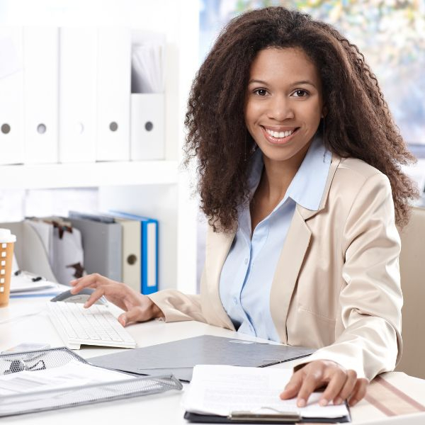 A women who is working and smiling