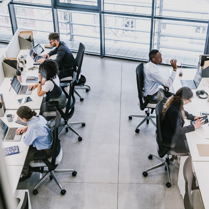 Overhead view of office with modern desks and comfortable chairs 4 Reasons Why Michigan Businesses Trust Kerr Albert for their Office Needs 4.jpg