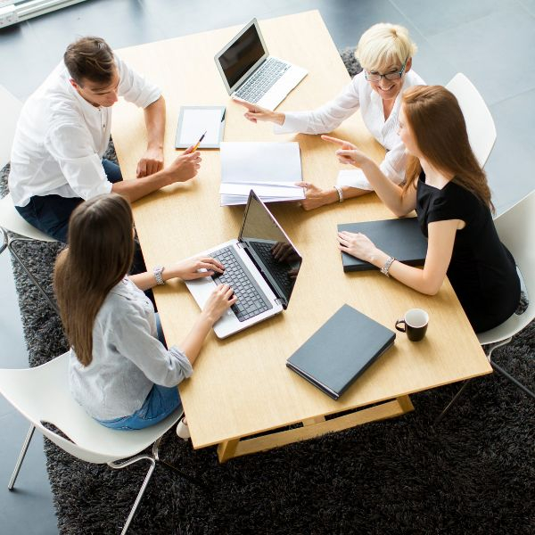 Four coworkers collaborating 