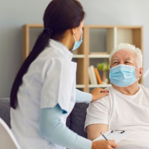 nurse working with patient