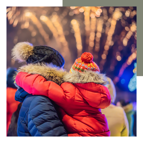 mom and daughter watching fireworks