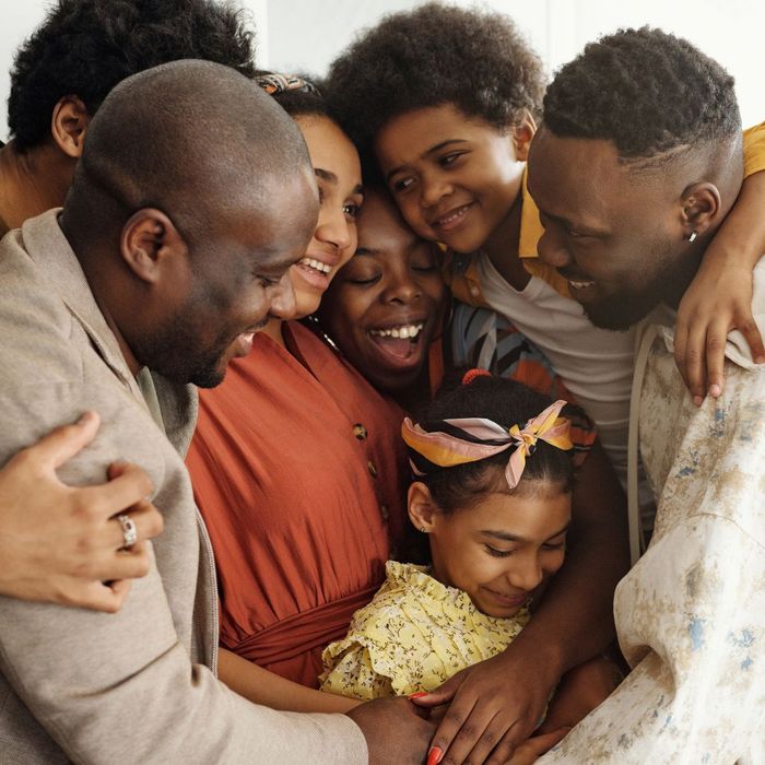 big family hugging big family hugging