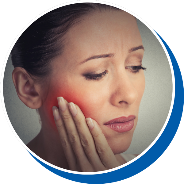 a woman holding her cheek in pain General Dentistry Services Redesign (3).png