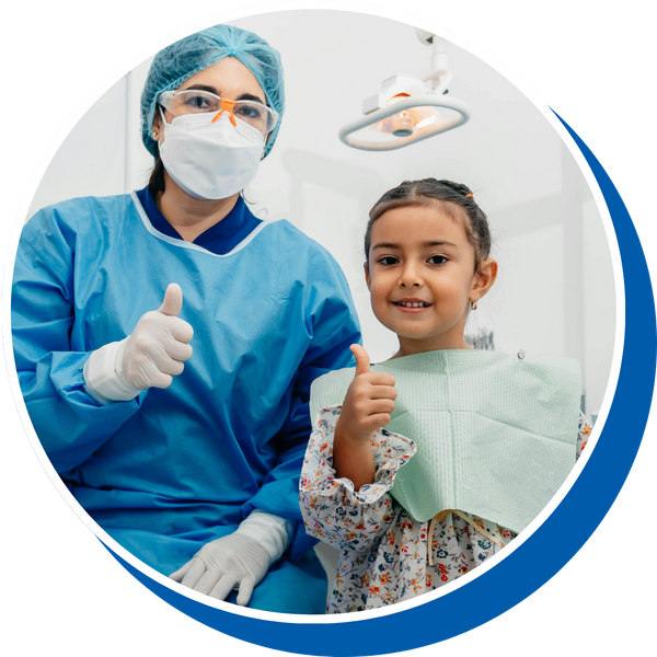 a child and dentist giving a thumbs up General Dentistry Services Redesign.png