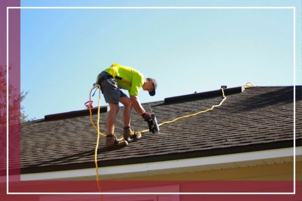 A roofer installing a roof