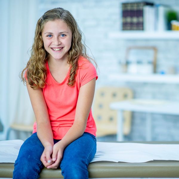 young girl in doctors office