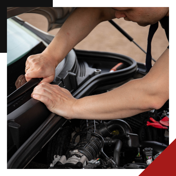 Technician removes windshield