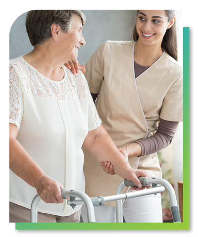 Image of a caregiver walking with a resident