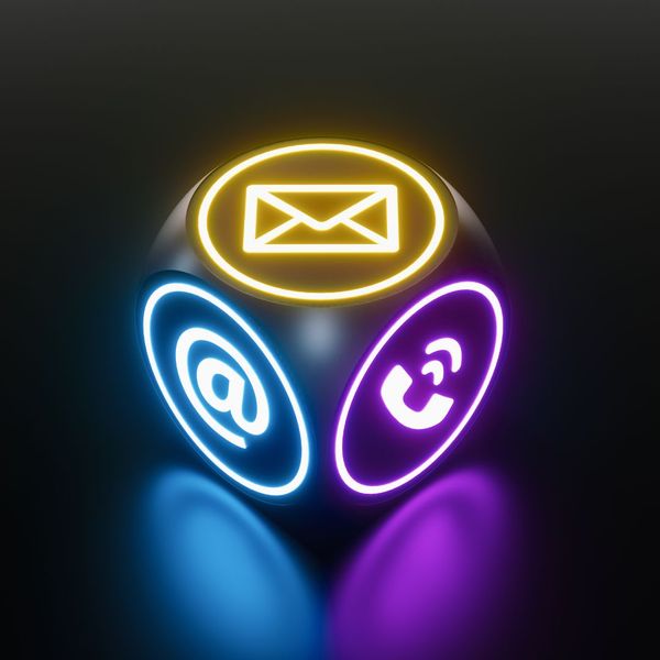 Dice with neon graphics representing contact information.