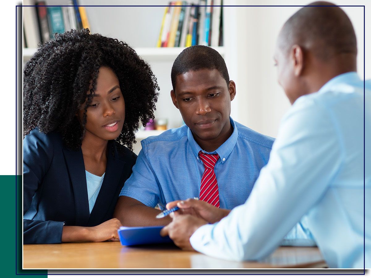 Couple talking to a buying agent