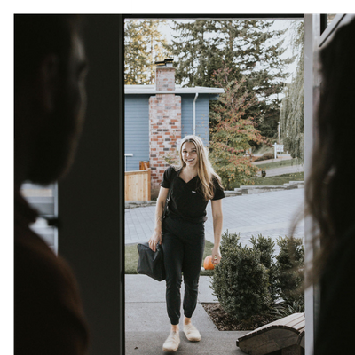 nurse arriving at a patient's house. 