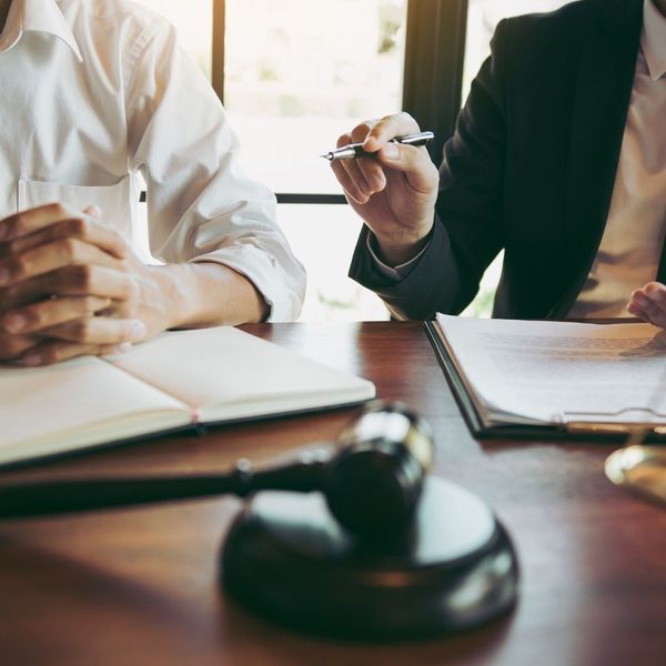 lawyer consulting with client