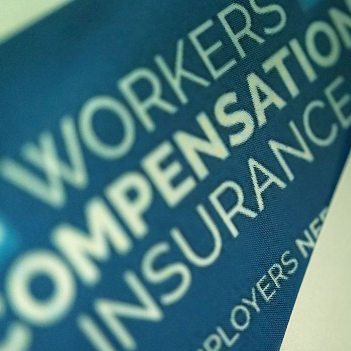 Piece of paper that says "Workers Compensation Insurance."
