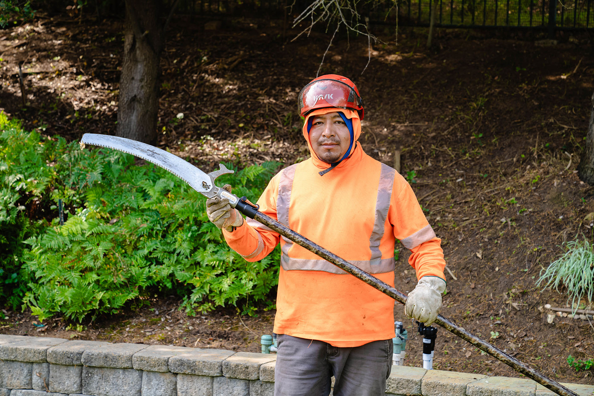 man holding Revolution pruner