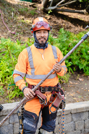 man holding Revolution pruner