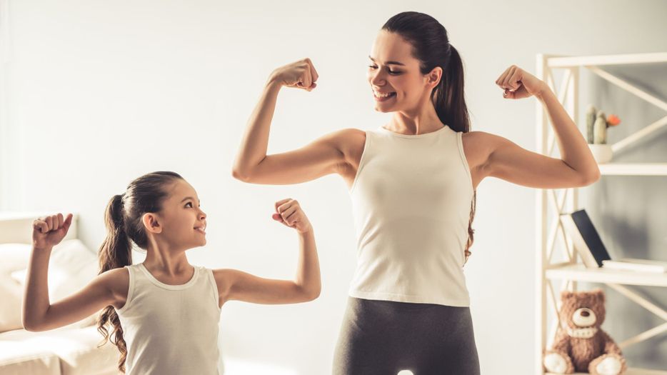 Mom and daughter working out 