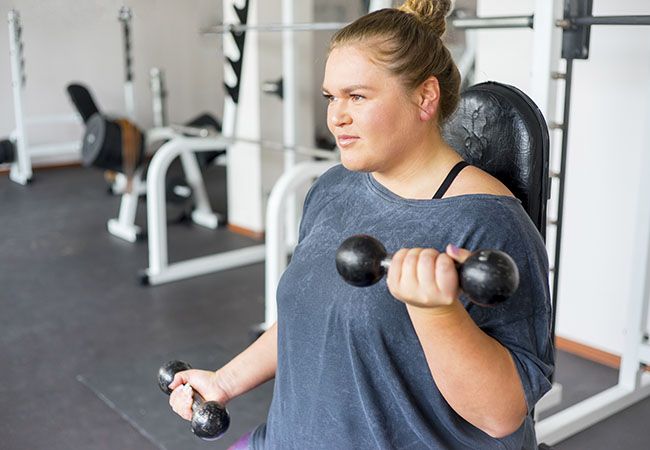 Woman working out in a gym