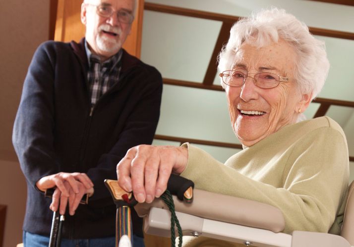 elderly couple with stair lift