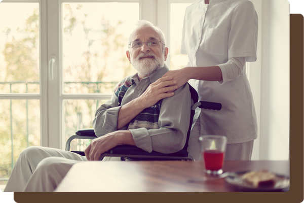caregiver resting hand on older man's shoulder caregiver resting hand on older man's shoulder