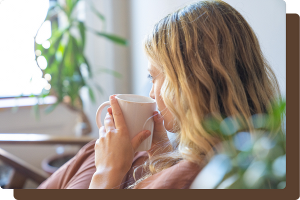 Woman sipping coffee