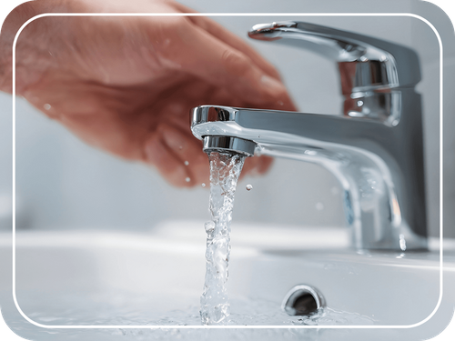 water running out of a bathroom faucet