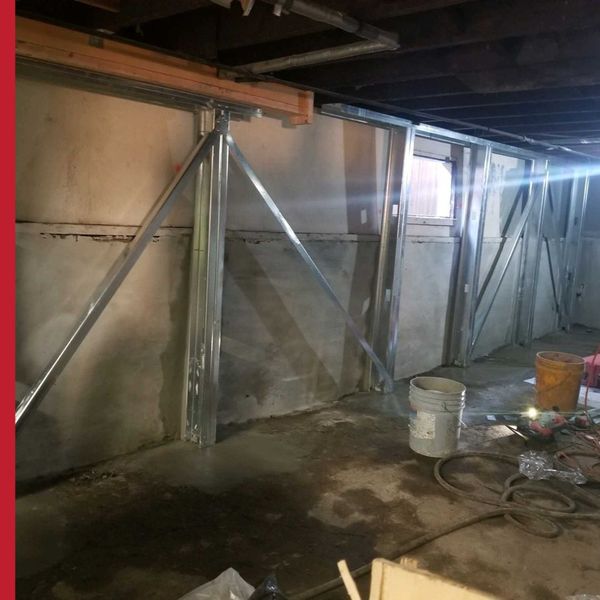 metal supports under house