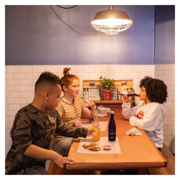 group of kids enjoy a meal