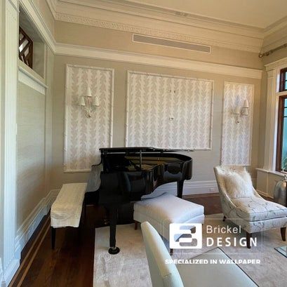 room with piano and wallpaper