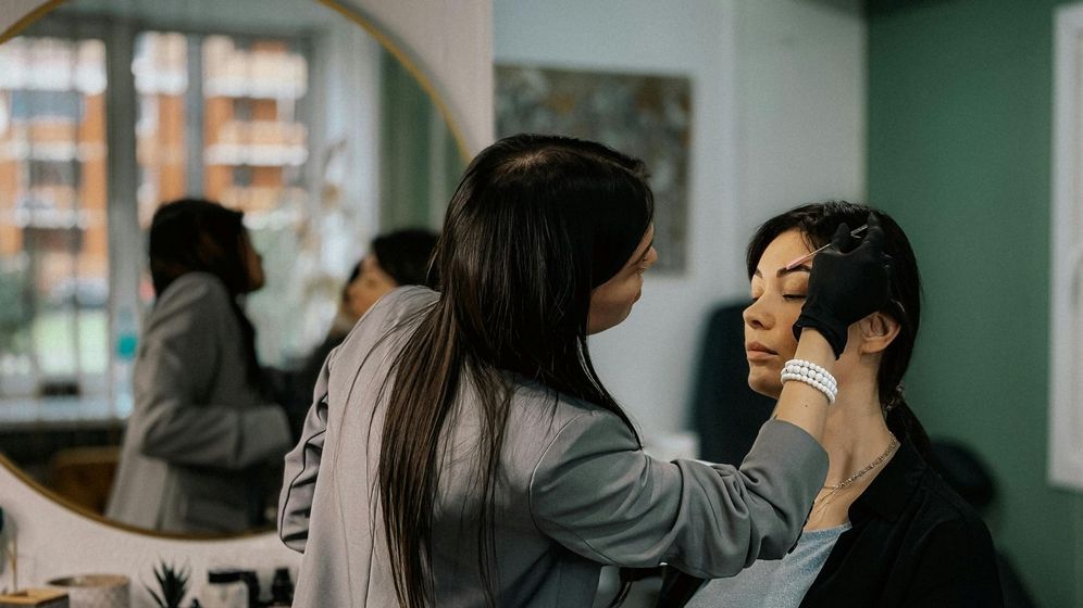 woman getting her brows laminated woman getting her brows laminated