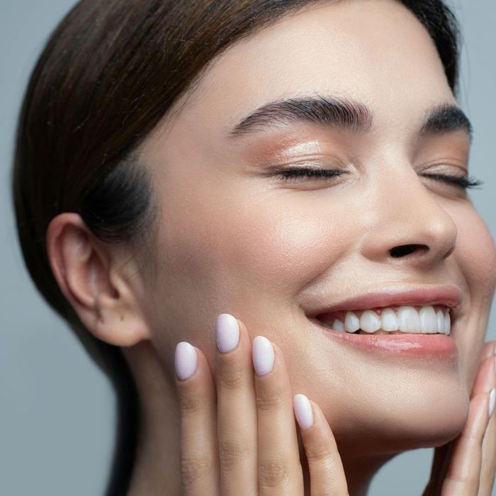 smiling woman with clear skin
