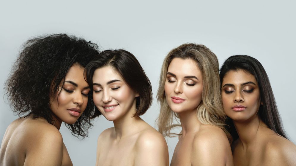 four women with clear skin