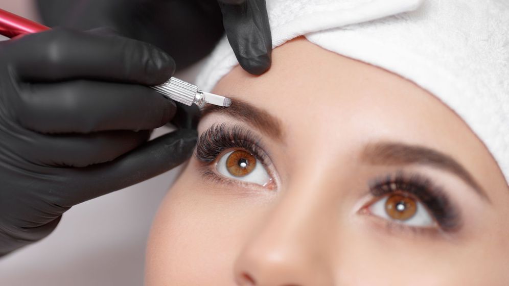 Woman getting brows done 