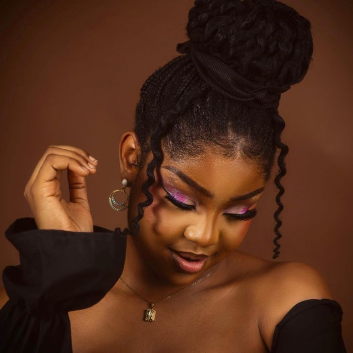 woman showing off her thick hair