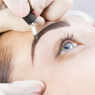 Closeup photo of the eyebrow microblading process