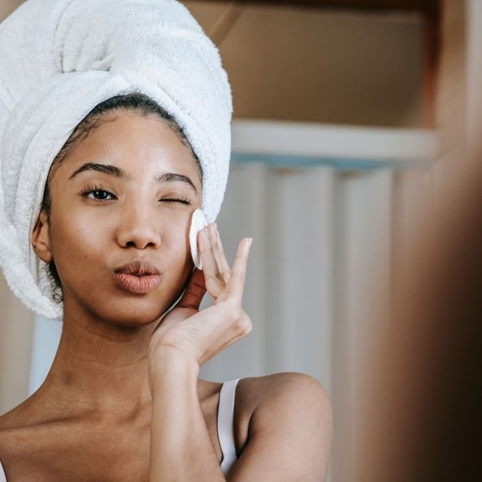 woman admiring her complexion