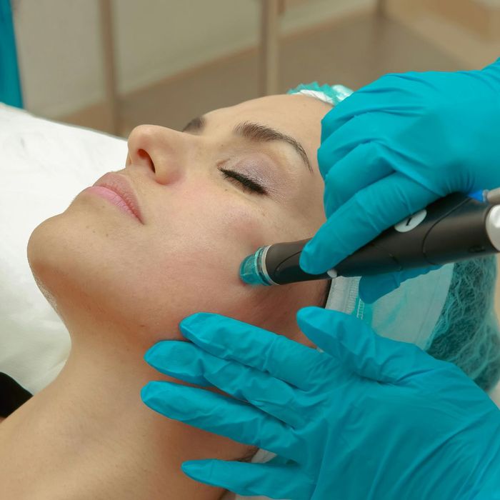 woman undergoing hydrafacial treatment woman undergoing hydrafacial treatment