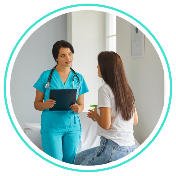 nurse talking to patient in clinic