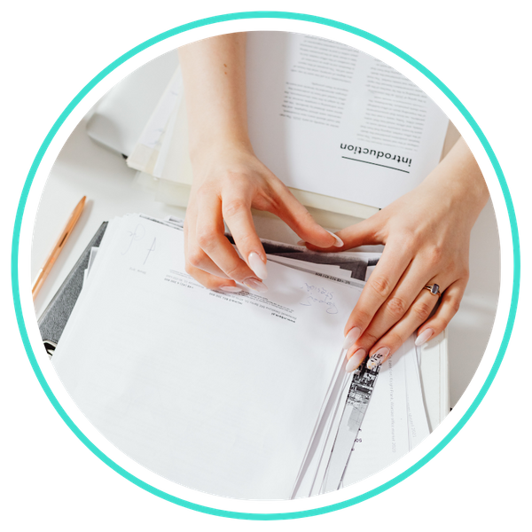 person going through printed documents