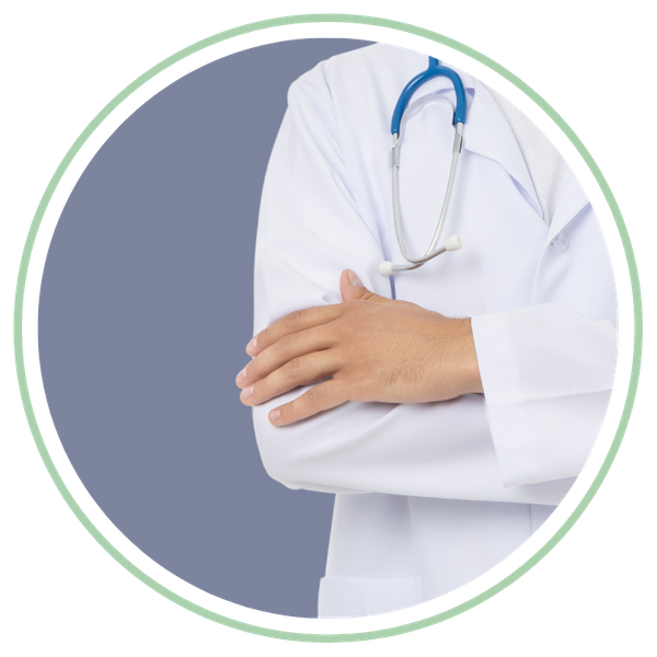 close up of a healthcare worker with arms crossed showing white jacket and stethoscope