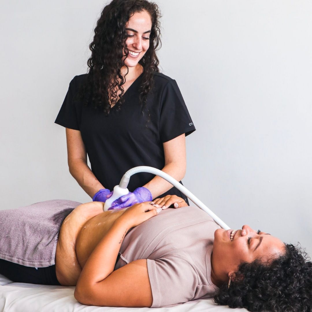 Esthetician performing Cryoskin treatment on a client