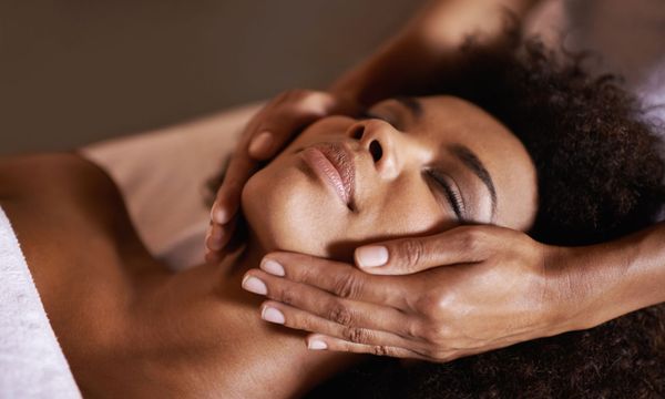 Person getting a facial massage