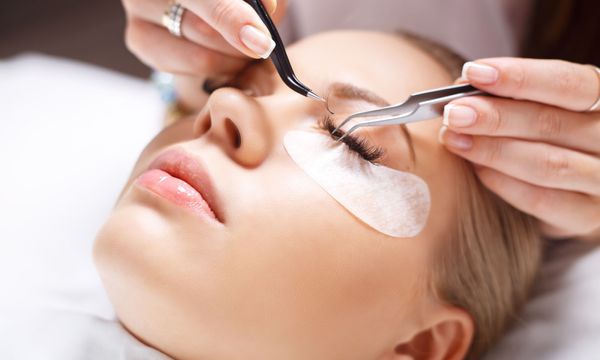 Eyelash extensions being applied