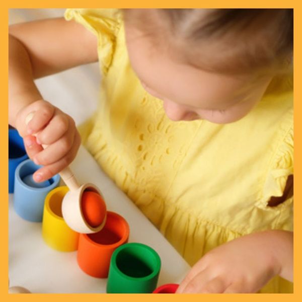 toddler playing with toy